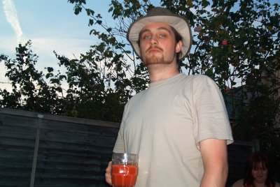 Ron drinks some punch